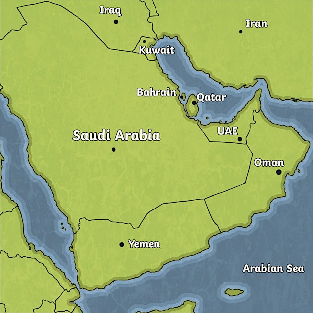 Family exploring Qatar with a physical map in hand